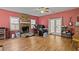 Open-concept living area featuring a brick fireplace and French doors at 533 Coolsprings Walk, Woodstock, GA 30188