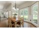 Breakfast nook filled with natural light, perfect for casual dining with views of the backyard at 3275 Cherry Oak Ln, Cumming, GA 30041