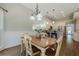 Breakfast nook with natural lighting and an open connection to the kitchen and living spaces at 3275 Cherry Oak Ln, Cumming, GA 30041
