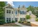 Charming two-story home with a well-maintained lawn and attached two-car garage at 3275 Cherry Oak Ln, Cumming, GA 30041