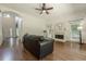 Spacious living room featuring a fireplace, high ceilings, and large windows at 3275 Cherry Oak Ln, Cumming, GA 30041