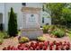 East Park Village brick community sign surrounded by flowers, trees, and landscaping at 3374 Verdi Ln, Kennesaw, GA 30144