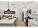 Bright kitchen with stainless steel appliances, quartz countertops, and a center island at 3374 Verdi Ln, Kennesaw, GA 30144