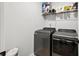 Laundry room with side by side, modern washer and dryer units at 3374 Verdi Ln, Kennesaw, GA 30144
