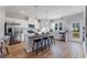 Modern kitchen featuring stainless steel appliances, granite countertops, and a breakfast bar with seating at 5846 Schelton Se Pl, Mableton, GA 30126