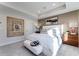 Comfortable main bedroom with natural light, a tray ceiling, neutral colors and carpeted floors at 5846 Schelton Se Pl, Mableton, GA 30126