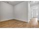 Bright bedroom featuring hardwood flooring and crisp white trim at 150 Rolison Way, Fayetteville, GA 30214