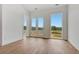Bedroom features large windows with natural light and outdoor views at 150 Rolison Way, Fayetteville, GA 30214