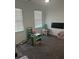 Bright bedroom with playroom featuring lots of natural light and gray carpet at 162 Camden Woods Dr, Dallas, GA 30157