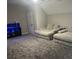View of the living room featuring two layered couches, TV stand, and gray carpet at 162 Camden Woods Dr, Dallas, GA 30157