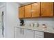 A clean kitchen with bright countertops and modern cabinets; equipped with stainless steel appliances at 200 Pine Tree Ln, Mcdonough, GA 30252
