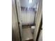 Bathroom with a white and purple shower curtain and white tile flooring, offering a clean and functional space at 2500 Trent Dr, Marietta, GA 30066