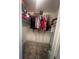 Walk-in closet with shelving, hanging racks and carpet at 2500 Trent Dr, Marietta, GA 30066