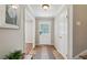 Inviting home entrance featuring a tiled floor, neutral walls, and a charming front door at 5510 Stoneybrook Se Ct, Mableton, GA 30126