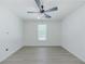 Bedroom with window and plank flooring, offering a bright and inviting atmosphere at 2335 Huntington Dr, Loganville, GA 30052