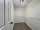 A walk-in closet with wire shelving and ample storage space at 2335 Huntington Dr, Loganville, GA 30052