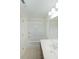 Bathroom includes tile floor, tiled shower, large mirror, and vanity at 3692 Lambert Ne Ln, Brookhaven, GA 30319