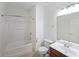 Bathroom with shower and tub combination, and a wood vanity at 3692 Lambert Ne Ln, Brookhaven, GA 30319