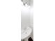Bathroom includes pedestal sink, large mirror and modern lighting at 3692 Lambert Ne Ln, Brookhaven, GA 30319