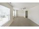 Bedroom includes carpet, ceiling fan, window with blinds and large closet at 3692 Lambert Ne Ln, Brookhaven, GA 30319