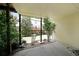 Covered patio with posts surrounded by greenery and mulch at 3692 Lambert Ne Ln, Brookhaven, GA 30319