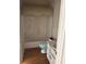 Cozy bathroom features a tub, toilet, vanity, and hardwood flooring at 4504 Allen Hollow, Suwanee, GA 30024