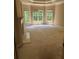 Bedroom featuring a fireplace and large windows at 4504 Allen Hollow, Suwanee, GA 30024