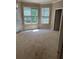 Bedroom with two windows and a door to the outside deck at 4504 Allen Hollow, Suwanee, GA 30024
