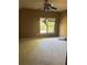 Bedroom with a window featuring a ceiling fan at 4504 Allen Hollow, Suwanee, GA 30024