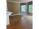 Dining room features hardwood floors and natural light at 4504 Allen Hollow, Suwanee, GA 30024