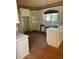 Traditional kitchen featuring white cabinetry, ample counter space and abundant natural light at 4504 Allen Hollow, Suwanee, GA 30024