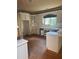 Bright kitchen with white cabinets and natural light at 4504 Allen Hollow, Suwanee, GA 30024