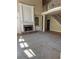 Open-concept living room featuring soaring ceilings, fireplace, built ins, and lots of natural light at 4504 Allen Hollow, Suwanee, GA 30024