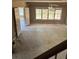 Spacious living room with lots of natural light and views of the deck at 4504 Allen Hollow, Suwanee, GA 30024