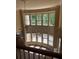 Upper view of living room with wall of windows showing natural light at 4504 Allen Hollow, Suwanee, GA 30024