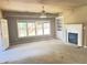 Living room featuring a fireplace and natural light at 4504 Allen Hollow, Suwanee, GA 30024