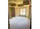 Main bedroom showing tray ceiling and large window ready for your design ideas at 4504 Allen Hollow, Suwanee, GA 30024