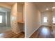 Inviting entryway features wood-look flooring and access to various rooms at 1057 Towne Mill Xing, Canton, GA 30114