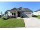 Charming single-Gathering home with a well-manicured lawn and inviting curb appeal at 1057 Towne Mill Xing, Canton, GA 30114