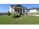 A cozy home featuring pretty landscaping, neat lawn and neutral colors at 1057 Towne Mill Xing, Canton, GA 30114