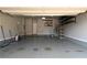 An organized garage with shelving and a door leading to the house at 1057 Towne Mill Xing, Canton, GA 30114