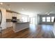 Bright, open kitchen with a center island and stainless-steel appliances at 1057 Towne Mill Xing, Canton, GA 30114