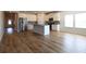 Open kitchen with center island, stainless steel appliances and lots of counter space at 1057 Towne Mill Xing, Canton, GA 30114
