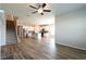 Open concept living room with hardwood floors connecting the kitchen at 1057 Towne Mill Xing, Canton, GA 30114