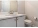 Small bathroom featuring white sink vanity, toilet and door at 2601 Brandenberry Dr, Decatur, GA 30034