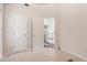 This bedroom has an entrance to a stairwell and carpet at 2601 Brandenberry Dr, Decatur, GA 30034