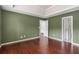 Bedroom boasts hardwood floors, tray ceiling, and ample space at 2601 Brandenberry Dr, Decatur, GA 30034
