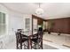 Bright dining area adjacent to the living room with natural light, creating a warm and inviting atmosphere at 2601 Brandenberry Dr, Decatur, GA 30034