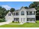 Beautiful two-story home with a two-car garage and inviting front yard in a residential neighborhood at 2601 Brandenberry Dr, Decatur, GA 30034
