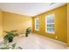 This living room has two windows and plants at 2601 Brandenberry Dr, Decatur, GA 30034